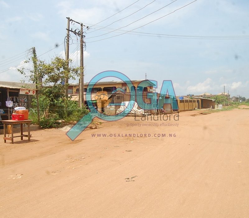 Bus stop - A Compound with 3 Bungalows and an Upstairs Foundation for Sale at Igbogbo, Ikorodu, Lagos