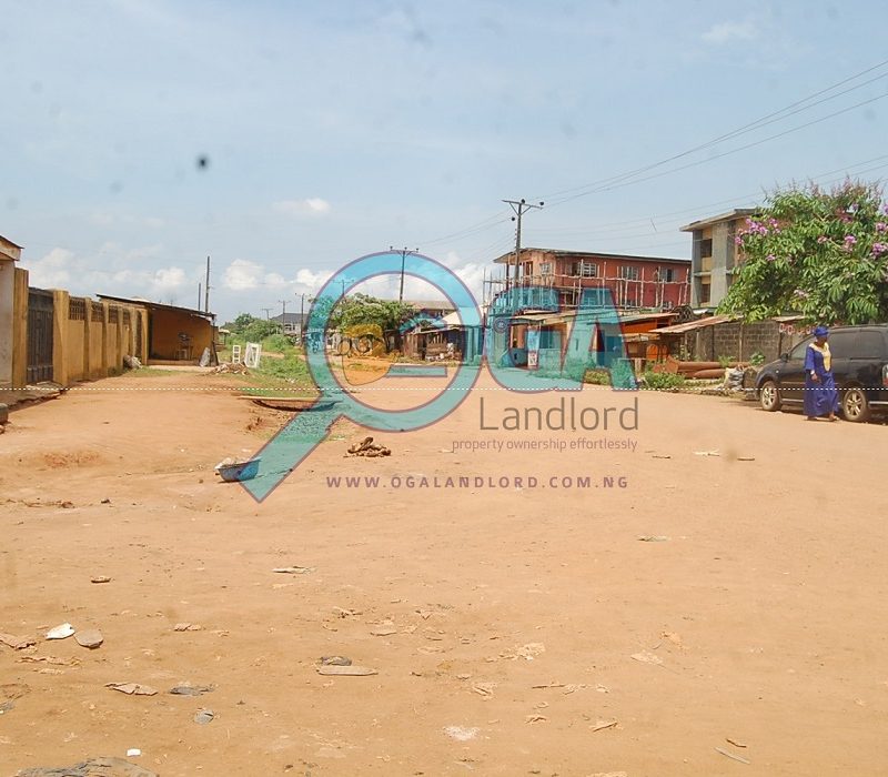 Bus stop - A Compound with 3 Bungalows and an Upstairs Foundation for Sale at Igbogbo, Ikorodu, Lagos